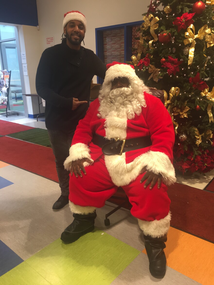 Christopher Cardwell poses with Soul Santa in this provided photo