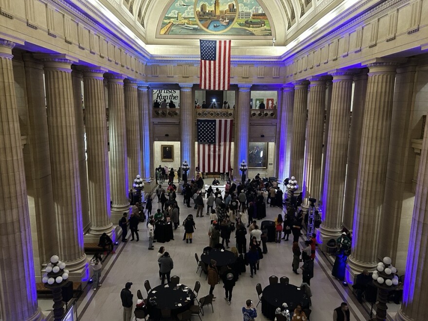 Overhead look down on city hall with party going on