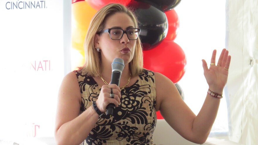 Kyrsten Sinema speaks with Rob Portman at the Portman Center opening