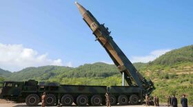 This picture taken and released on July 4, 2017 by North Korea's official Korean Central News Agency (KCNA) shows North Korean leader Kim Jong Un inspecting the test-fire of the intercontinental ballistic missile Hwasong-14 at an undisclosed location. (STR/AFP/Getty Images)