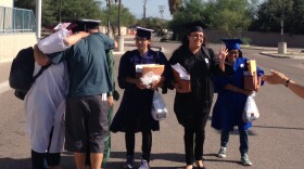 Dream 9 immigrant activists walk away from a Greyhound bus depot in Nogales, Ariz. when they were freed in August, pending asylum hearings.