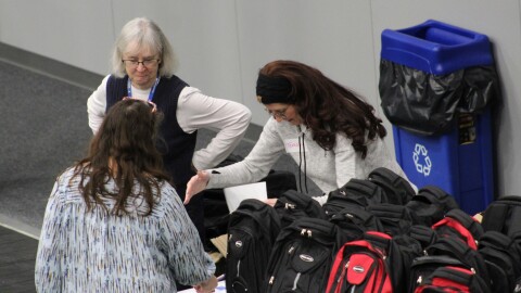 Cathy Gensel (rear left) helps coordinate the 2026 Project Homeless Connect event on Tuesday, Jan. 27, 2026 in Soldotna, Alaska.