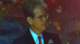 Tom Coburn speaking at a Tulsa Chamber event.