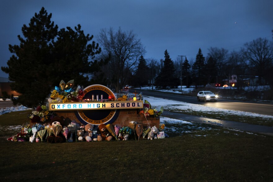 A makeshift memorial sits outside Oxford High School in Oxford, Mich., last week.