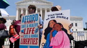 Activists celebrate the Supreme Court's ruling on birthright citizenship, outside of the Supreme Court on Capitol Hill, Tuesday, June 30, 2026, in Washington.