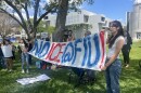 Students chanted and held up signs in protest to FIU's partnership with ICE.