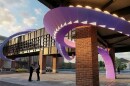 It resembles an illuminated ribbon or vine spiraling around the expansion walkway representing the connection between the existing convention center and the new facility.