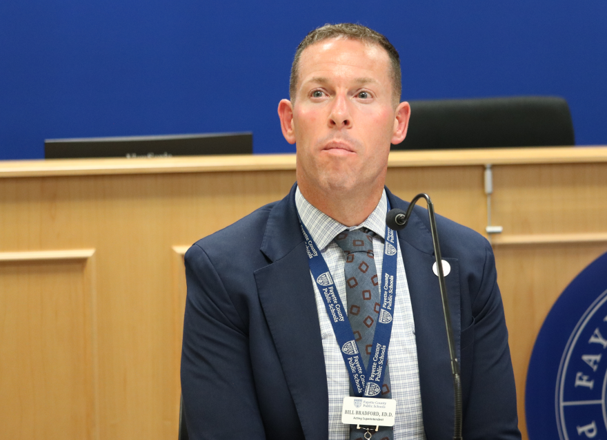 Fayette County Public Schools Acting Superintendent Bill Bradford discusses the addendum to his contract at the Fayette County Board of Education building on July 22, 2026. He will work as both the assistant superintendent and the acting superintendent indefinitely.