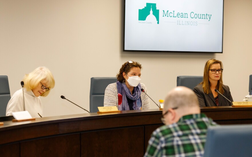 New McLean County Board chair Elizabeth Johnston, center, alongside County Clerk Kathy Michael, left, and County Administrator Cassy Taylor.