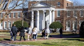 A tour of prospective students walk to the Mary Francis Stone Building on campus at the University of North Carolina Greensboro campus Friday, Jan. 27, 2023 in Greensboro, N.C. (Photo by Lynn Hey for WUNC)