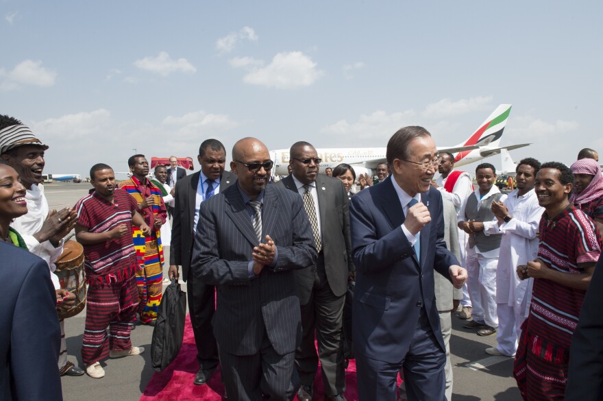 Secretary-General Ban Ki-moon (right, with blue necktie) arrives in Addis Ababa, Ethiopia, for the International Conference on Financing for Development.