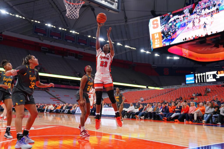 Alyssa Latham (23, white) scores a layup in SU's win over Boston College.