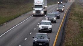 In this photo made Wednesday, Nov. 1, 2017, a driver stays in the passing lane as traffic accumulates behind along I-70 in Montgomery County, Missouri.