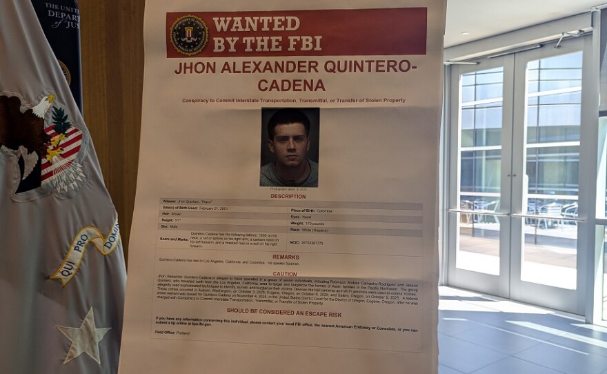 At the press conference on May 19, 2026, officials displayed wanted posters for the suspects still at large in the burglary cases.