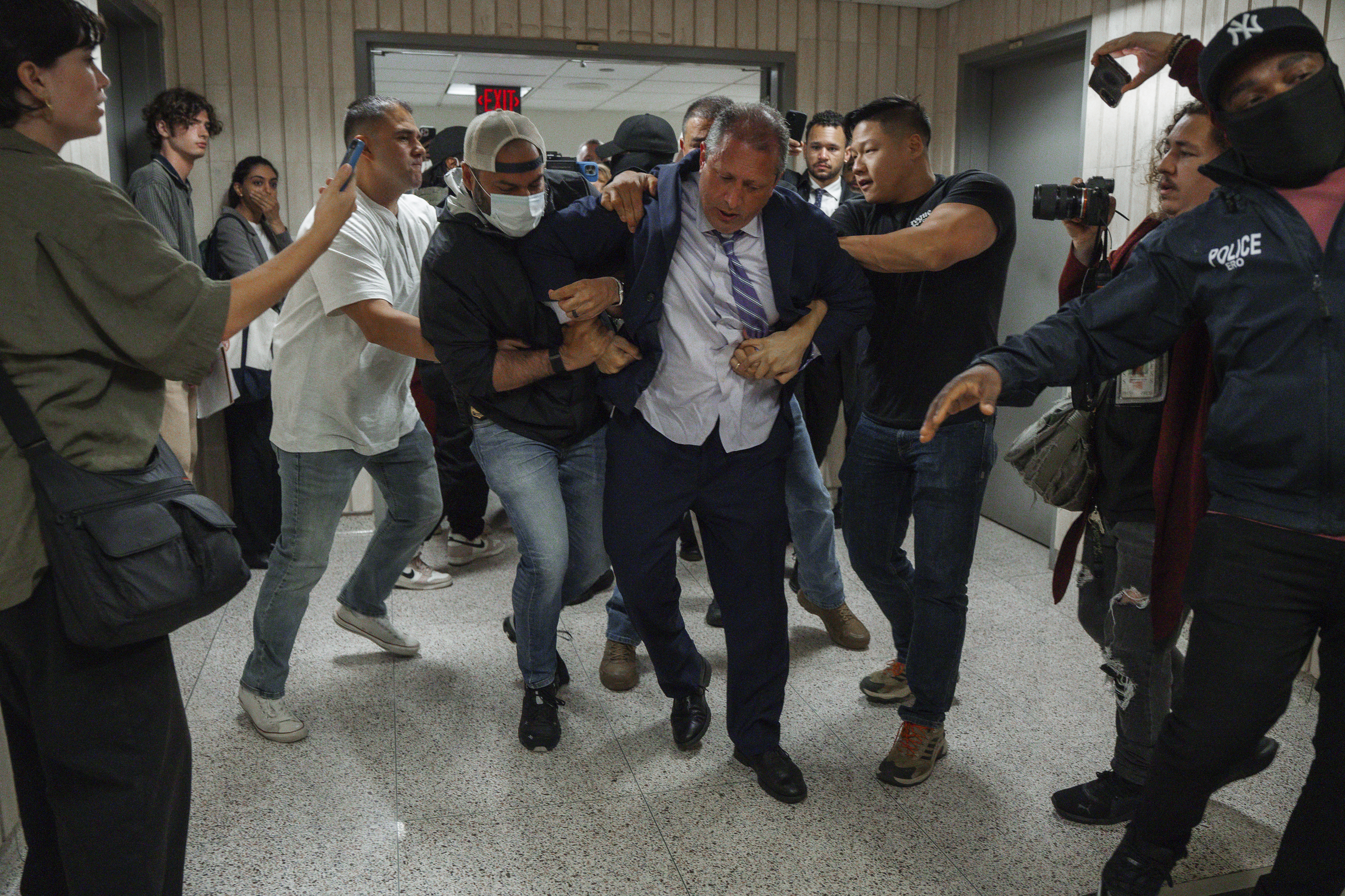 NYC mayoral candidate arrested at immigration court after linking arms with  man being detained | WGCU News | PBS & NPR for Southwest Florida