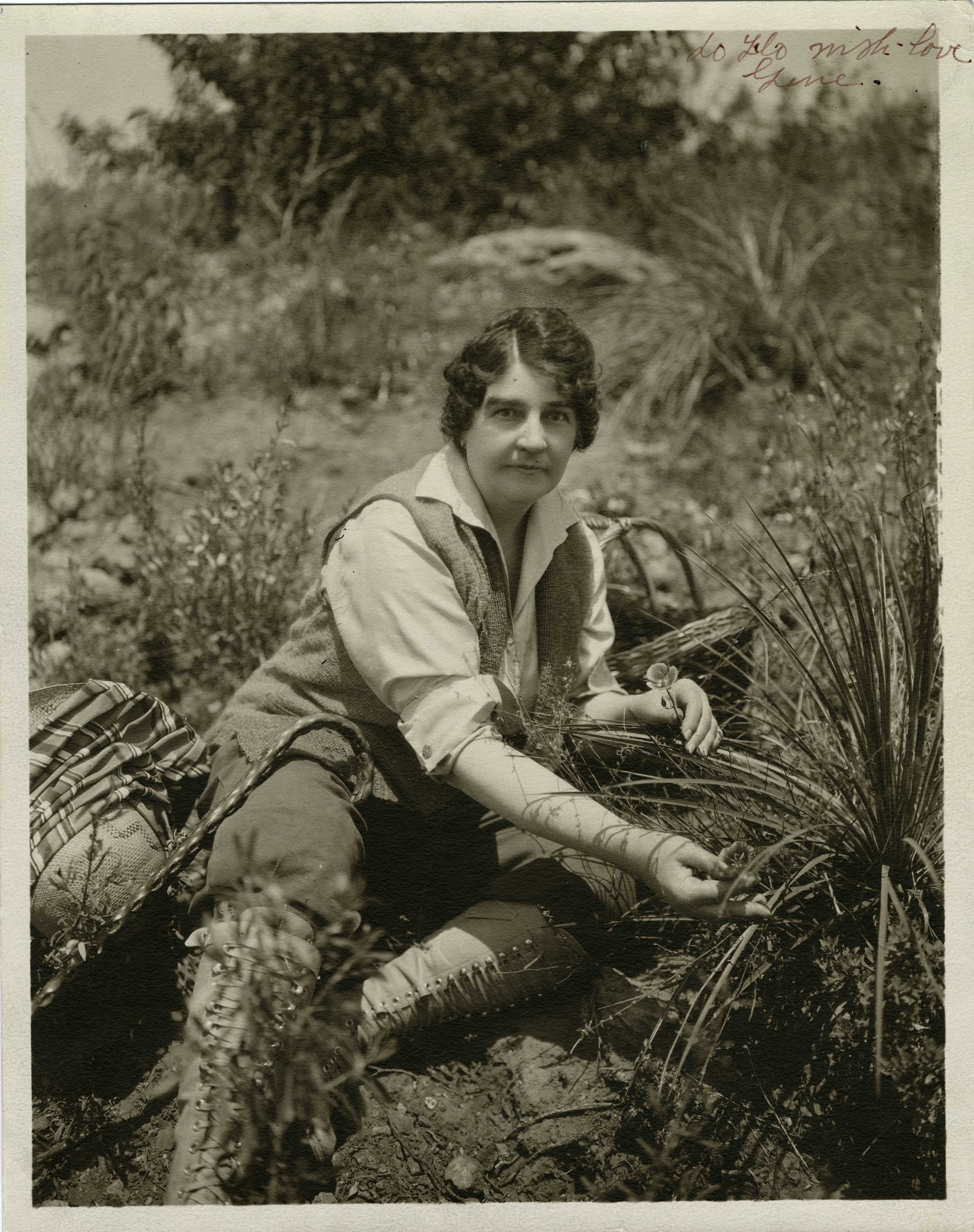 Sepia-toned publicity photo of Gene Stratton-Porter working in the field.