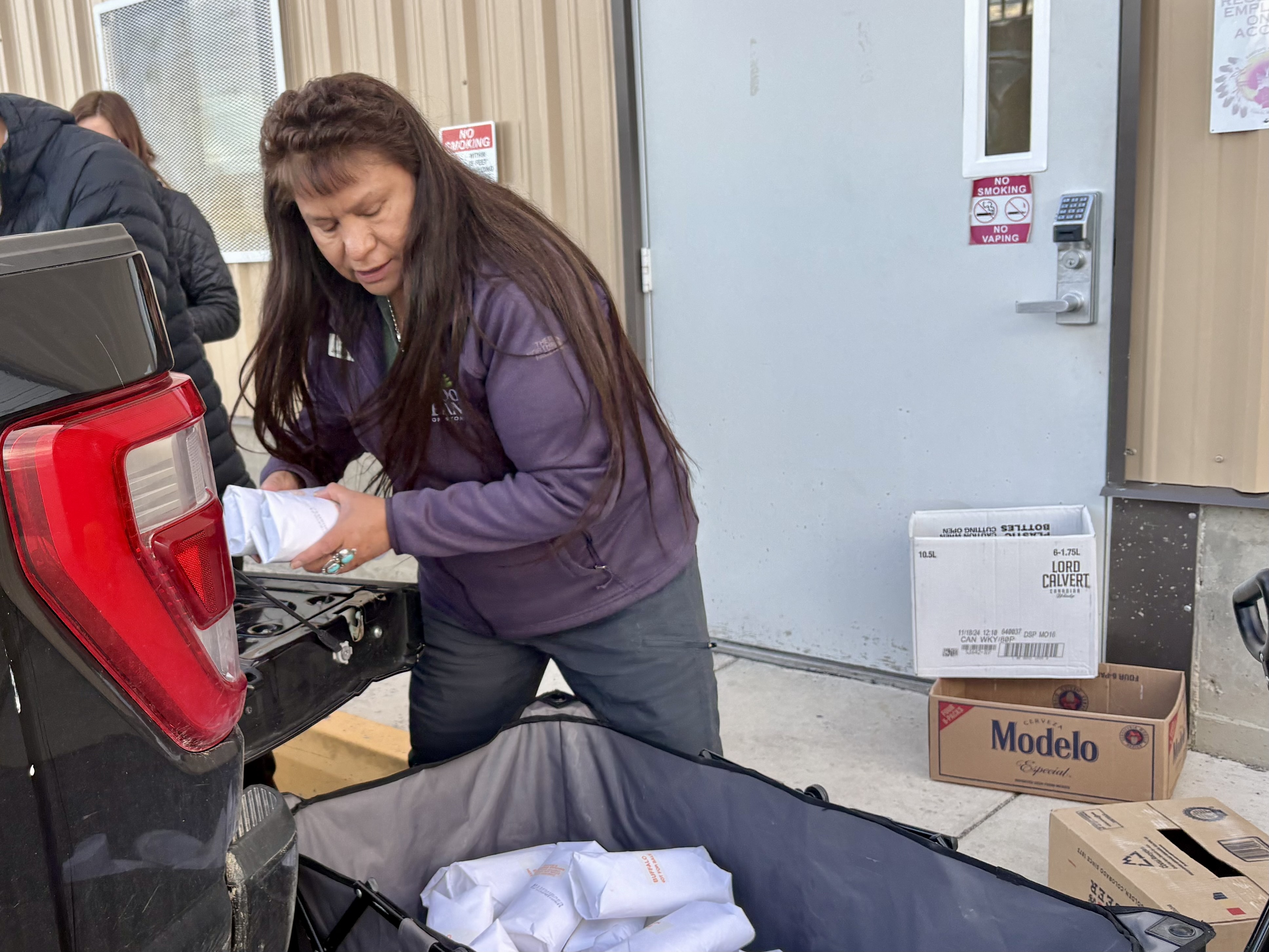 Behind the scenes of a food distribution on the Wind River
