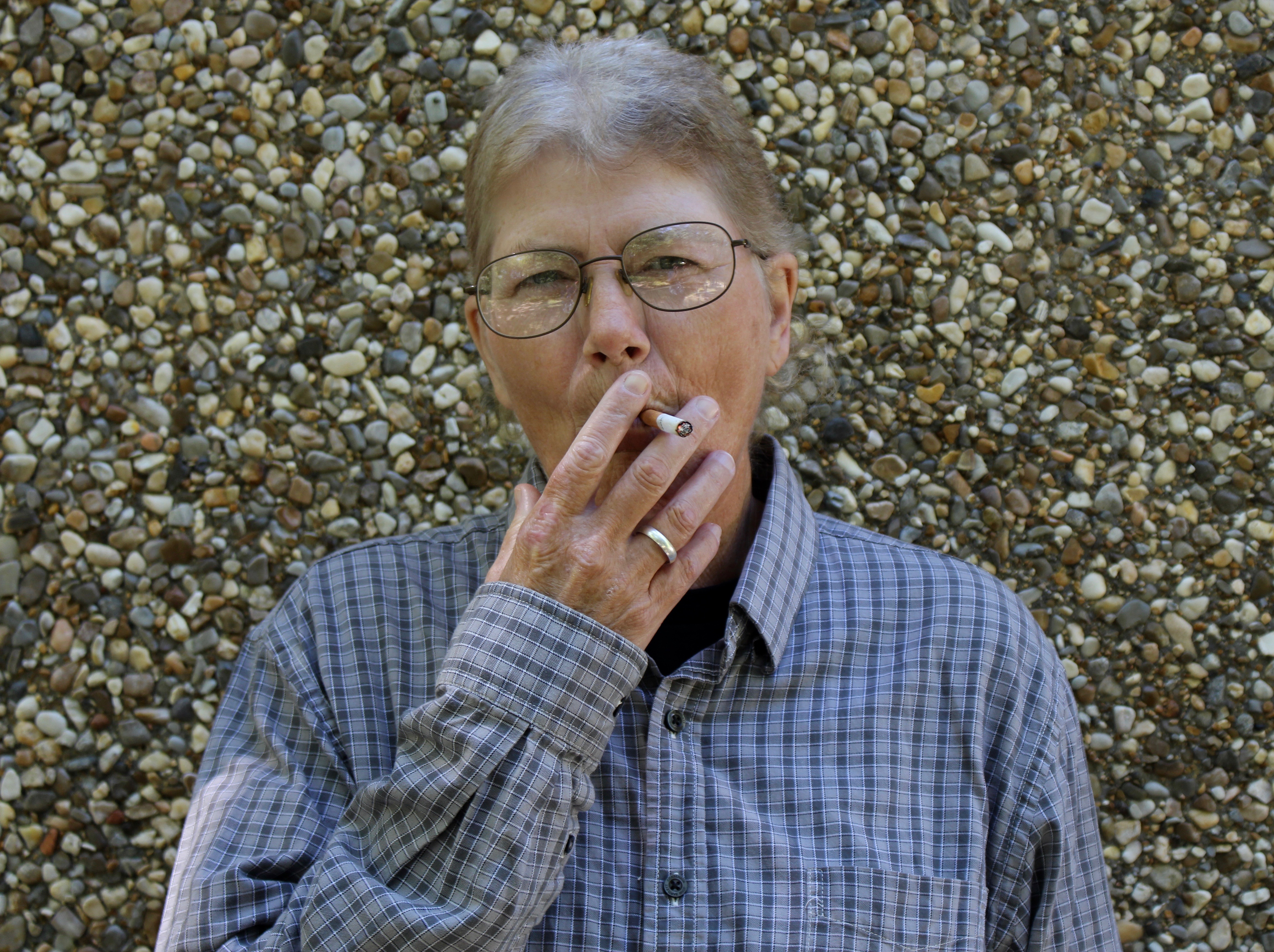 HIV-positive smoker tries to quit one cigarette at a time